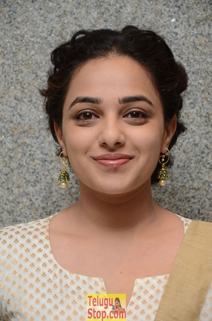 Nithya menen new stills- Photos,Spicy Hot Pics,Images,High Resolution WallPapers Download
