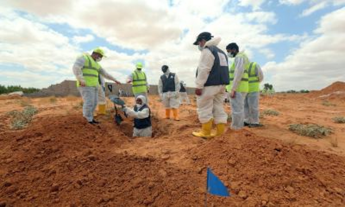  12 Bodies Recovered In Libya Mass Graves-TeluguStop.com