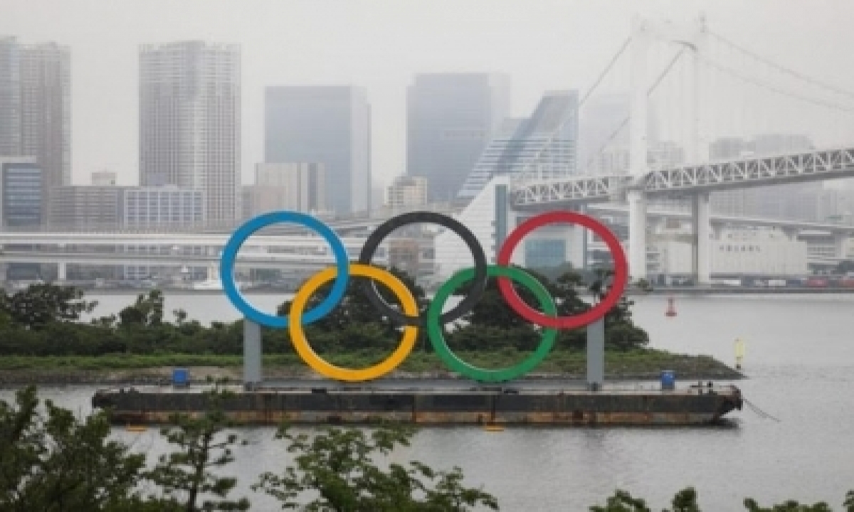  Giant Olympic Rings Returns To Tokyo Bay-TeluguStop.com