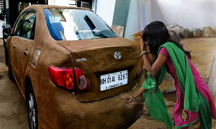  She Uses Cow Dung For Her Car To Reduce Sun Heat-TeluguStop.com