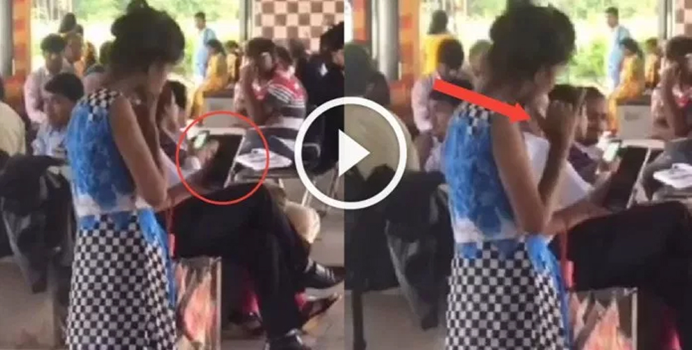 స్మార్ట్ ఫోన్ పట్టుకొని సైగల స్మార్ట్ ఫోన్ పట్టుకొని సైగల