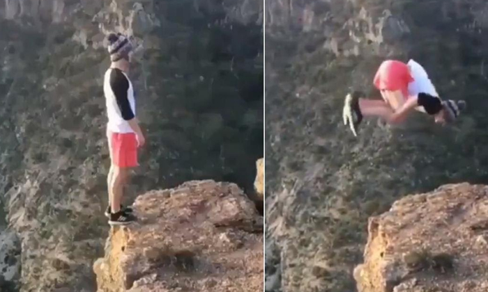  Man Does Backflip On The Edge Of A Cliff Sparks A Debate On The Internet , Selfi-TeluguStop.com