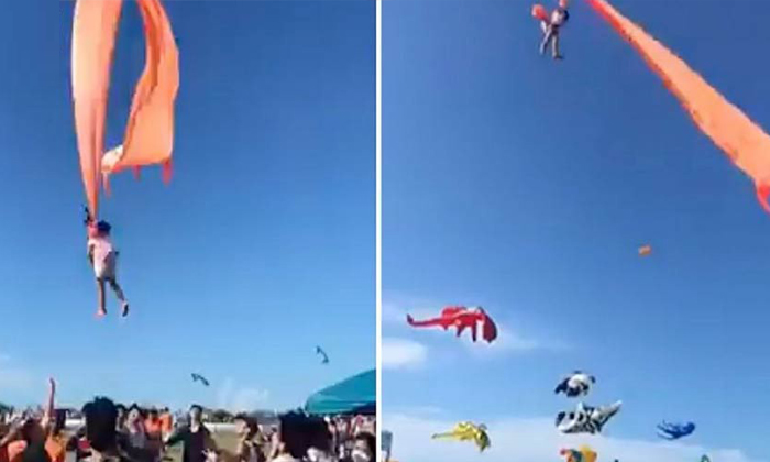  Kite Swings Child Into The Air At Taiwan Festival, Taiwan Kite Festival, 3 Year-TeluguStop.com