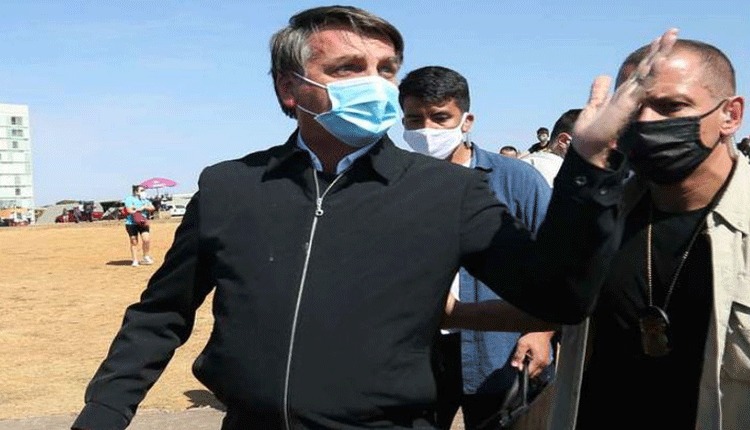  Brazilian President Jair Bolsonaro Threatens To Punch Report In The Face.-TeluguStop.com