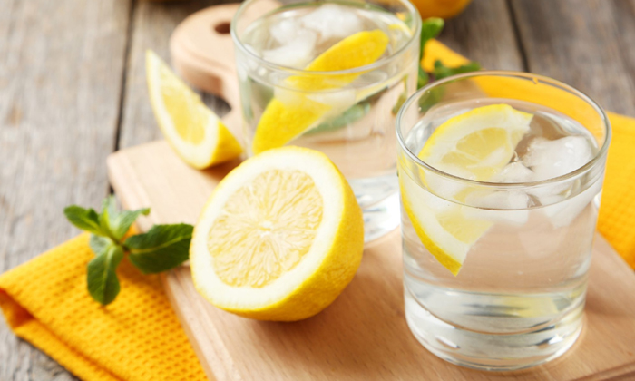  Amazing Health Benefits Of Lemon Water,lemon Water,belly Fat,immunity System,vit-TeluguStop.com