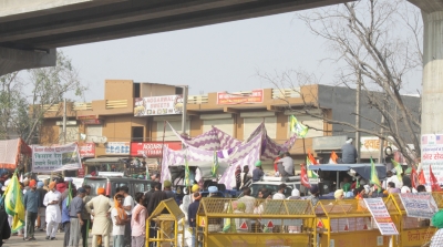  Farmers Continue Peaceful Protest At Tikri Border-TeluguStop.com