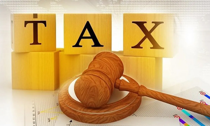 Indian Origin In Uk Company Director Banned For Not Paying Income Tax, Swiss Ban-TeluguStop.com