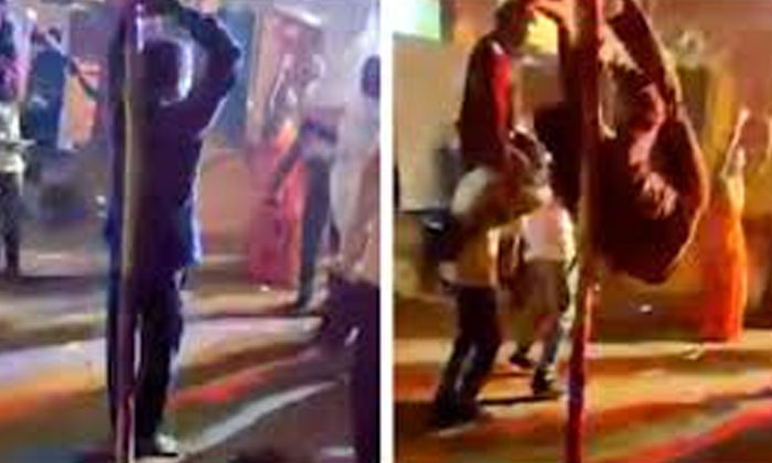 A Drunken Man Who Broke His Waist While Going For A Pole Dance Viral Video , Vir-TeluguStop.com