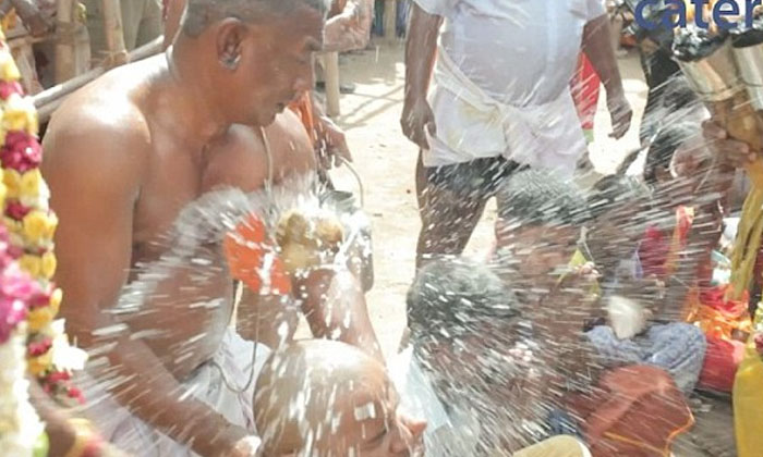  In This Temple A Man Is Beaten On The Head Instead Of A Coconut God What Is The-TeluguStop.com