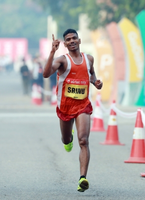  Bugatha, Sudha Win New Delhi Marathon Titles-TeluguStop.com