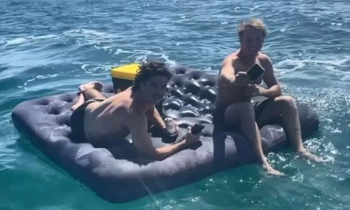  Two Men Drift Away To Sea While Chugging Beers On A Blow Up Mattress,west Austra-TeluguStop.com