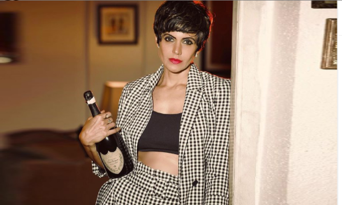  Mandira Bedi Facing Negative Comments For Promoting Liquor Products In Social Me-TeluguStop.com