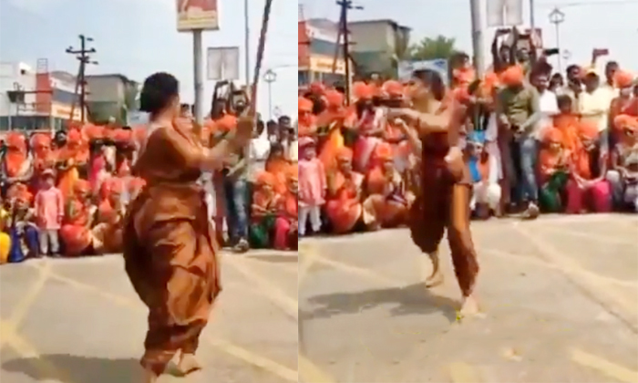  Viral Video Woman Doing Stunts With Sword And Stick In An Unexpected Way ,  Vira-TeluguStop.com