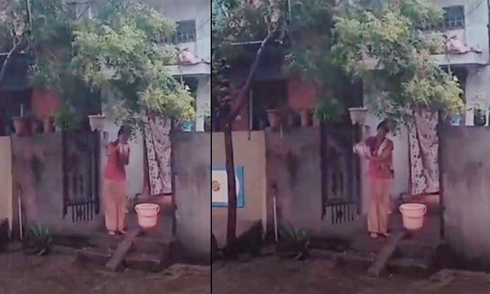  Crazy Woman Watering Infront Of The Home During Raining , Woman Watering, Heavy,-TeluguStop.com