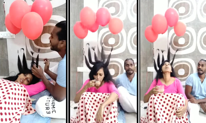  Viral Video Husband Made Funny Task On His Wife Hair With Balloons , Viral Lates-TeluguStop.com