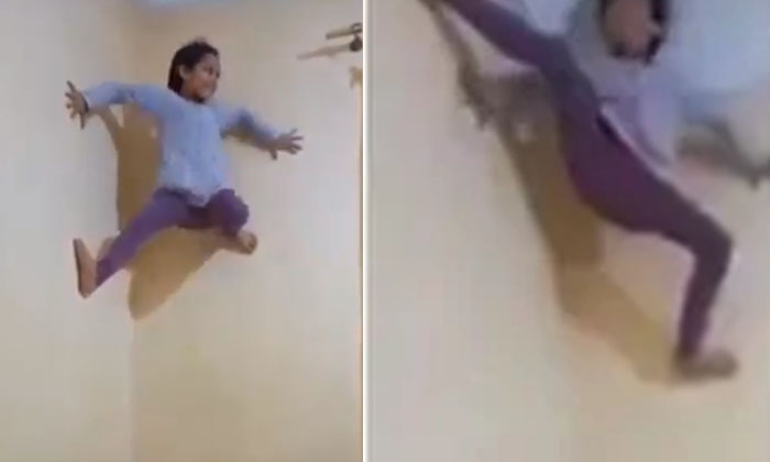  Little Girl Climbs Wall Like Spider Man Amazing Talent Baffles The Internet , Be-TeluguStop.com