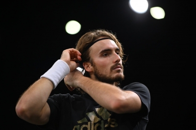  Australian Open: Tsitsipas Tested By Argentina’s Baez On Way To Third Roun-TeluguStop.com