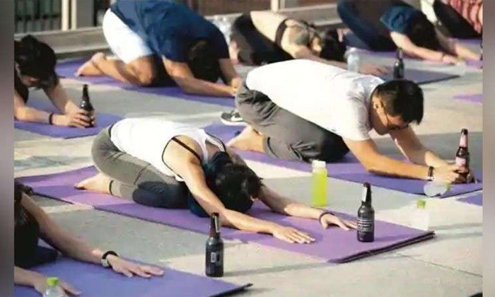  Perform Yoga With Consumption Of Beer - A New Trend Details, Yoga, Beer, Beer Yo-TeluguStop.com