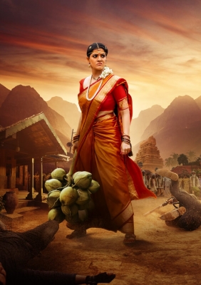  Varalaxmi Sarathkumar's Flamboyant First Look Unveiled By Kiccha Sudeep-TeluguStop.com