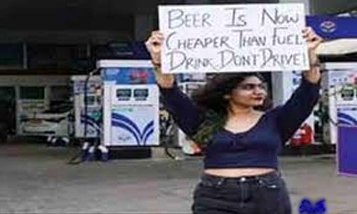  Girl Who Says Beer Is Cheaper Than Petrol , Petrol , Beer , Less Cost , Socia-TeluguStop.com