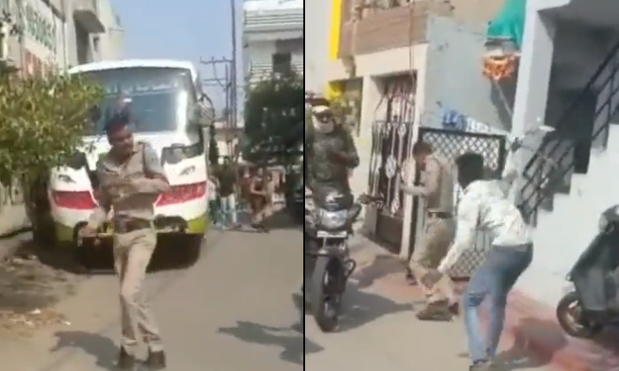  Man Washed With Baton By Police Video Goes Viral, Viral Video, Viral News, Soci-TeluguStop.com