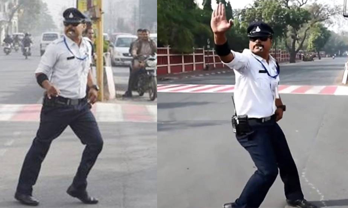  Indore Dancing Cop Ranjith Singh Helps Poor Children Buys Slippers Details, Traf-TeluguStop.com