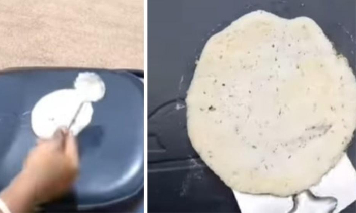  Viral Video Man Cooks Dosa On Bike Seat In Hyderabad Details, Man Cooks Dosa ,bi-TeluguStop.com