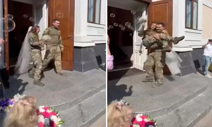 Viral Video Ukraine Couple Gets Married In Military Uniform Details, Military Un Viral Video Ukraine Couple Gets Married In Military Uniform Details, Military Un-TeluguStop.com