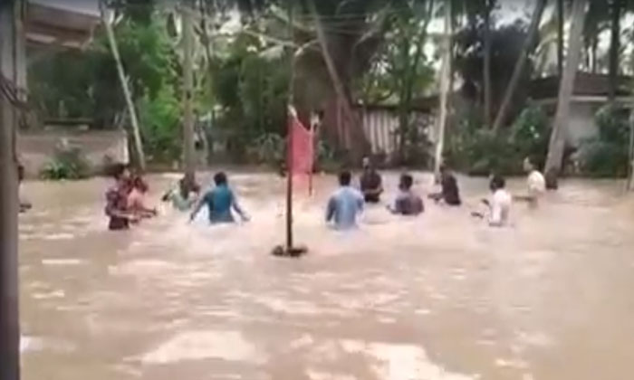  Youth Volleyball Game In The Water, Godavari District, Volleyball , Youth , And-TeluguStop.com