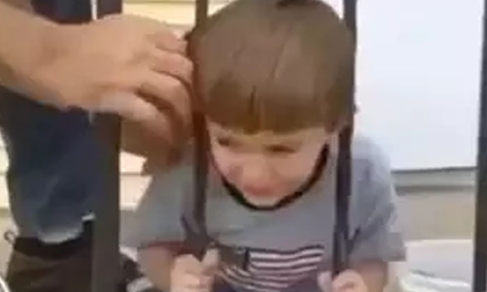  Boy Head Stuck In Iron Rods Video Goes Viral Boy Head, Stuck In Iron Rods, Viral-TeluguStop.com