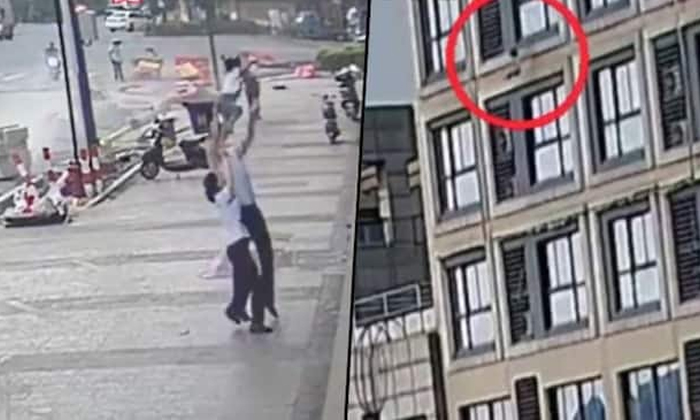  Viral Video Man Saved Child Life Who Fell Down From Fifth Floor Details, Viral L-TeluguStop.com