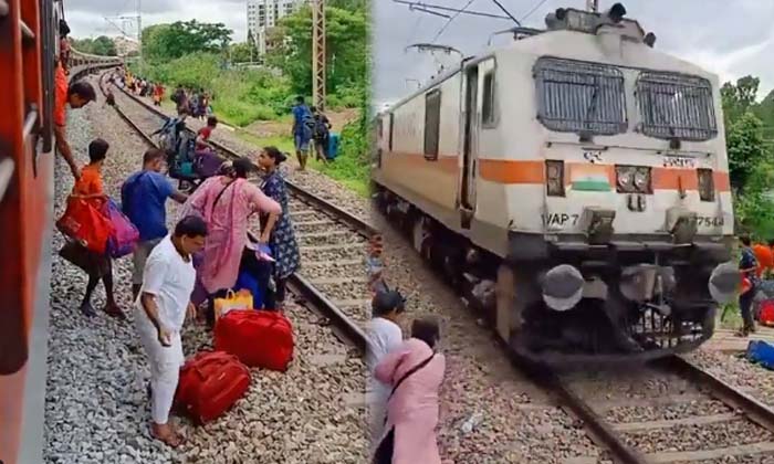  Video Women Who Cross The Tracks While The Train Is Rushing ,viral Latest, News-TeluguStop.com