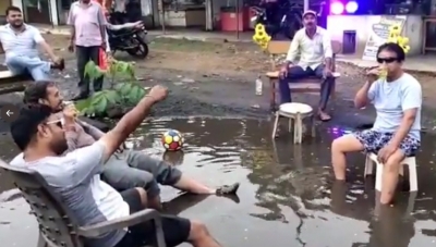  What An Idea! Mp Residents Throw Party On Pothole-filled Road-TeluguStop.com