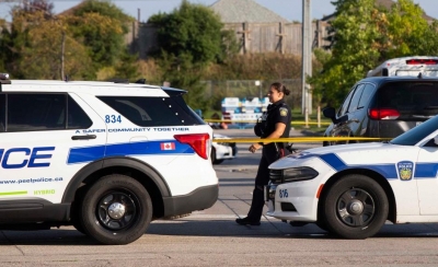  Canadian Police Officer Shot Dead, Suspect In Custody-TeluguStop.com