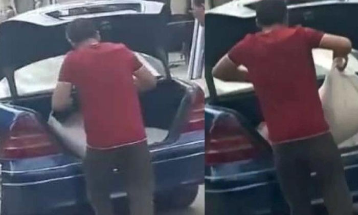  Man Picks Up Wheat And Cheap Ration In Mercedes Benz Car Video Goes Viral , Rati-TeluguStop.com