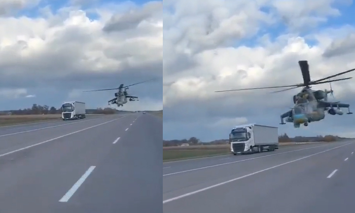  A Helicopter Flying Through The Middle Of The Cars , Ukraine, Russia, Video, Vir-TeluguStop.com