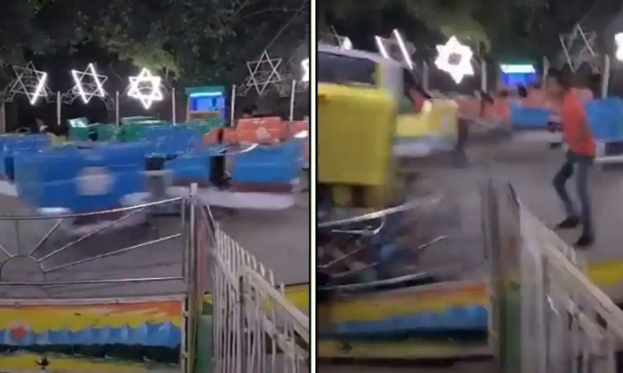  Swing Ride Accident In Delhi Ghaziabad Ramleela Maidaan Exhibition Details, Swin-TeluguStop.com