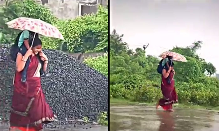  The Mother Who Carried Her Daughter On Her Shoulders In The Rain Netizens Are Je-TeluguStop.com