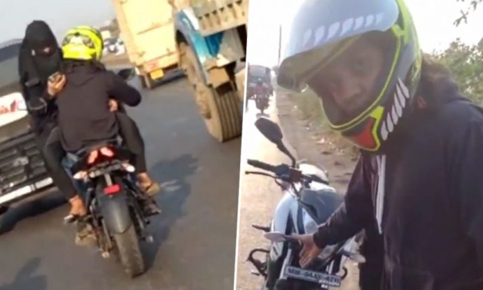  Burqa Clad Womans Bike Stunt With Male Rider Goes Viral,bike Stunts,thane Bhiwan-TeluguStop.com