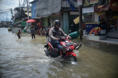  3-metre-high Flood Submerges Indonesia, 1 Killed-TeluguStop.com