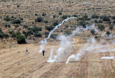  10 Palestinians Killed, 102 Injured In Clashes With Israeli Soldiers In West Ban-TeluguStop.com