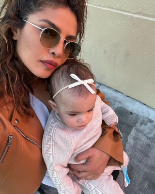  Priyanka Finally Lets A Glimpse Of Daughter Malti On Social Media-TeluguStop.com