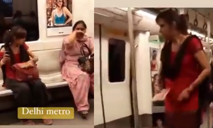  A Woman Who Pepper-sprayed A Fellow Passenger Video Went Viral, Delhi Metro Trai-TeluguStop.com