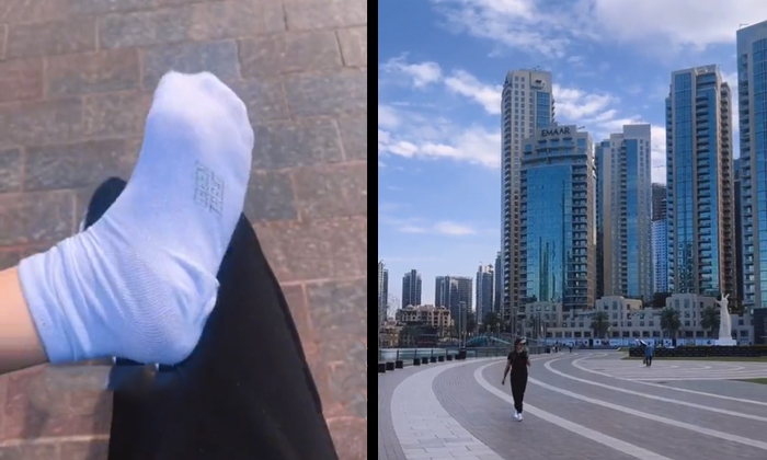  Woman Walks With White Socks On Streets Of Dubai To Show How Clean Uae City Is D-TeluguStop.com