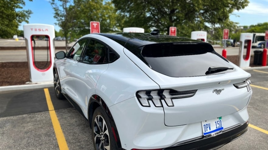  Tesla To Open Superchargers To Non-tesla Evs In Canada-TeluguStop.com