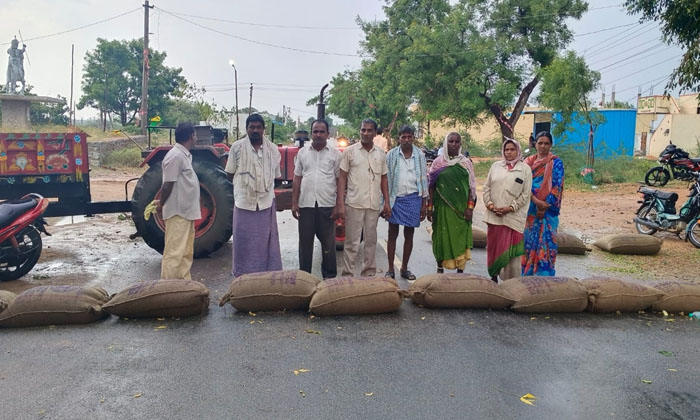  Stained Grain Angered Rice Farmers , Andem Krishna Reddy, Pacs-TeluguStop.com