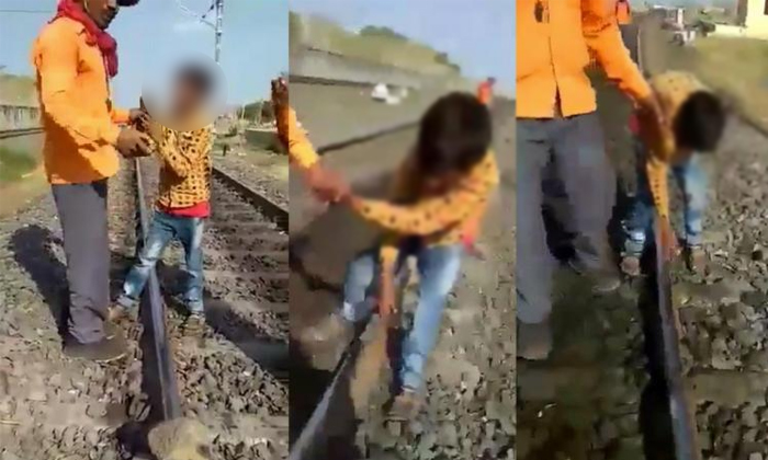  Video Of Boy Placing Stones On Railway Track In Karnataka Goes Viral Details, Mi-TeluguStop.com