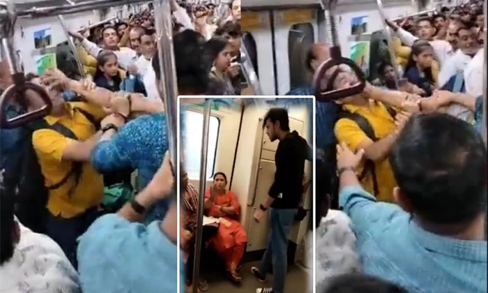  A Fight Broke Out Between Two People On Delhi Metro Details, Metro, Train, Fight-TeluguStop.com