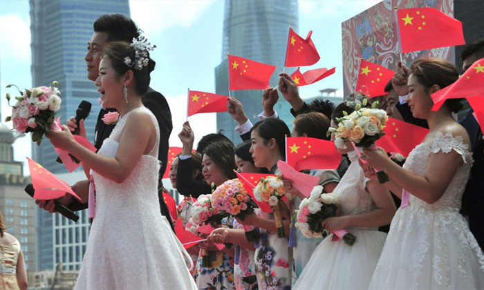  China Announced Bumper Offer For Those Who Get Married Under The Age Of 25 Detai-TeluguStop.com