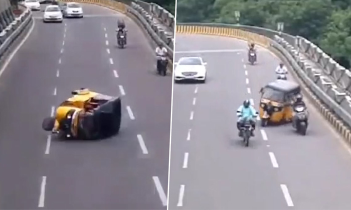  Auto Rickshaw Turned Turtle During Overtaking A Bike At The Durgam Cheruvu Cable-TeluguStop.com